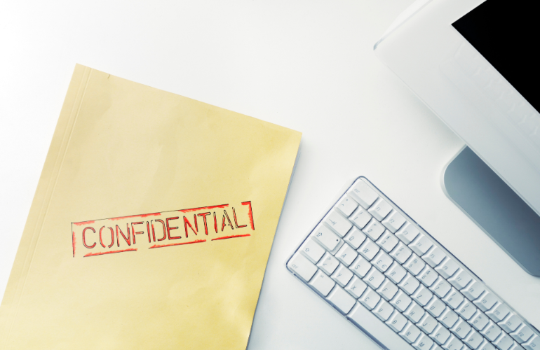 Confidentiality agreement envelope on the table
